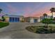 Modern beachfront home with attached garage and landscaped grounds at 717 Ocean Shore Blvd, Ormond Beach, FL 32176