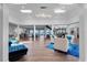 Open living space with hardwood floors, ocean views, and stylish furniture at 717 Ocean Shore Blvd, Ormond Beach, FL 32176