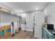 Laundry room with washer, dryer, and ample storage space at 717 Ocean Shore Blvd, Ormond Beach, FL 32176