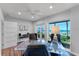 Home office with glass desk, ocean view, and comfortable seating at 717 Ocean Shore Blvd, Ormond Beach, FL 32176