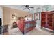 Guest bedroom with a metal bed frame and wooden armoire at 3425 S Atlantic Ave # 1105, Daytona Beach Shores, FL 32118