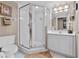 Bathroom featuring a shower, vanity, and toilet at 3425 S Atlantic Ave # 1105, Daytona Beach Shores, FL 32118