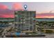 Aerial view of beachfront high-rise building with pool at 3425 S Atlantic Ave # 1105, Daytona Beach Shores, FL 32118