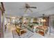Spacious living room features a large leather sofa and decorative coffee table at 3425 S Atlantic Ave # 1105, Daytona Beach Shores, FL 32118