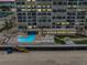 Oceanfront pool and lounge area at sunset at 3425 S Atlantic Ave # 1105, Daytona Beach Shores, FL 32118