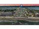 Aerial view showing beachfront location of building at sunset at 3425 S Atlantic Ave # 1105, Daytona Beach Shores, FL 32118