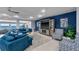 Community room boasts comfortable seating and a large TV at 3425 S Atlantic Ave # 1105, Daytona Beach Shores, FL 32118