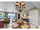 Elegant dining area with ocean views and a chandelier at 3425 S Atlantic Ave # 1105, Daytona Beach Shores, FL 32118