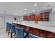 Modern community bar with seating and quartz countertop at 3425 S Atlantic Ave # 1105, Daytona Beach Shores, FL 32118