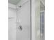 Clean shower with glass enclosure and tiled walls at 3425 S Atlantic Ave # 1105, Daytona Beach Shores, FL 32118