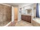 Bathroom features a large shower, vanity, and garden tub at 206 Laurel Point Ct, Deland, FL 32724