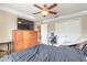 Bright bedroom with ceiling fan, large window and plenty of closet space at 206 Laurel Point Ct, Deland, FL 32724