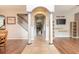 Elegant entryway with columns and wood flooring at 206 Laurel Point Ct, Deland, FL 32724