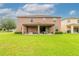 Two-story house with covered patio and spacious backyard at 206 Laurel Point Ct, Deland, FL 32724