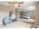 Home gym with elliptical and view into main bedroom at 206 Laurel Point Ct, Deland, FL 32724
