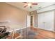 Home office with wood flooring, double doors, and access to the back yard at 206 Laurel Point Ct, Deland, FL 32724