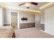 Bedroom with bathroom access, ceiling fan, and carpeted floor at 206 Laurel Point Ct, Deland, FL 32724