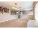 Spacious bonus room with carpet, light fixtures, and window coverings at 206 Laurel Point Ct, Deland, FL 32724