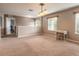 Bonus room with carpet, two workspaces, and a view of the hallway at 206 Laurel Point Ct, Deland, FL 32724