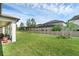 Fenced backyard with lush green grass at 2550 Cedar Shake Ct, Oviedo, FL 32765