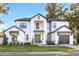 Stunning two-story home with modern design and landscaping at 858 Douglas Ave, Winter Park, FL 32789