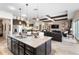 Modern kitchen with a large island, stainless steel appliances, and granite countertops at 2273 Grayling St, Orlando, FL 32820