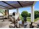 Outdoor kitchen with built-in grill and pergola at 2273 Grayling St, Orlando, FL 32820