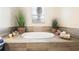Spa-like bathroom featuring a luxurious circular soaking tub at 2273 Grayling St, Orlando, FL 32820