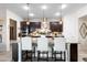 Island kitchen with granite countertops and dark wood cabinets at 2273 Grayling St, Orlando, FL 32820