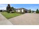House with a paved driveway and manicured landscaping at 2273 Grayling St, Orlando, FL 32820