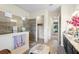 Bright bathroom showcasing a walk-in shower, toilet and double vanity at 2273 Grayling St, Orlando, FL 32820