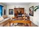 Home office with large wooden desk, comfortable seating, and globe at 2273 Grayling St, Orlando, FL 32820