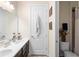 Clean bathroom with double vanity and access to additional bathroom at 2273 Grayling St, Orlando, FL 32820