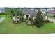 Two-story house with landscaped yard at 2273 Grayling St, Orlando, FL 32820