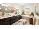 Elegant bathroom with double vanity, soaking tub, and walk-in shower at 2273 Grayling St, Orlando, FL 32820