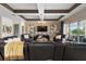 Spacious living room with leather furniture and high ceilings at 2273 Grayling St, Orlando, FL 32820