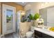 Charming bathroom with walk-in shower and backyard access at 2273 Grayling St, Orlando, FL 32820
