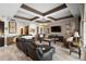 Bright living room with a coffered ceiling and fireplace at 2273 Grayling St, Orlando, FL 32820