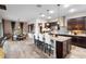 Open concept kitchen with granite countertops and an island at 2273 Grayling St, Orlando, FL 32820