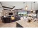 Open living area with a sectional sofa and view of the backyard at 2273 Grayling St, Orlando, FL 32820
