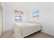Bright bedroom with double bed, window, and closet at 133 Cardinal Dr, Ormond Beach, FL 32176
