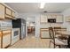 Bright kitchen with ample cabinetry, stainless steel appliances, and breakfast nook at 133 Cardinal Dr, Ormond Beach, FL 32176