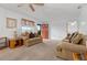 Cozy living room with neutral carpeting and two comfortable sofas at 133 Cardinal Dr, Ormond Beach, FL 32176