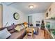 Living room featuring a sectional sofa, coffee table, and fish tank at 432 Marion St, Daytona Beach, FL 32114