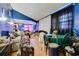 Living room with couches, a dining table and hardwood floors at 432 Marion St, Daytona Beach, FL 32114
