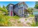 Rear view of a gray house with stairs at 432 Marion St, Daytona Beach, FL 32114