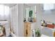Small bathroom with shower, sink, and vanity at 432 Marion St, Daytona Beach, FL 32114