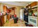 Kitchen with wood cabinets, double oven, and refrigerator at 432 Marion St, Daytona Beach, FL 32114