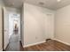 Bright hallway with wood flooring and access to bedrooms at 4088 Clock Tower Dr, Port Orange, FL 32129