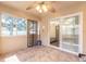 Bright sunroom with sliding doors and view of backyard at 4088 Clock Tower Dr, Port Orange, FL 32129